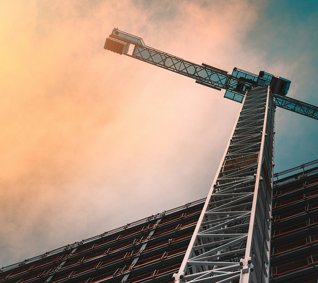 Construction Crane against sunset sky